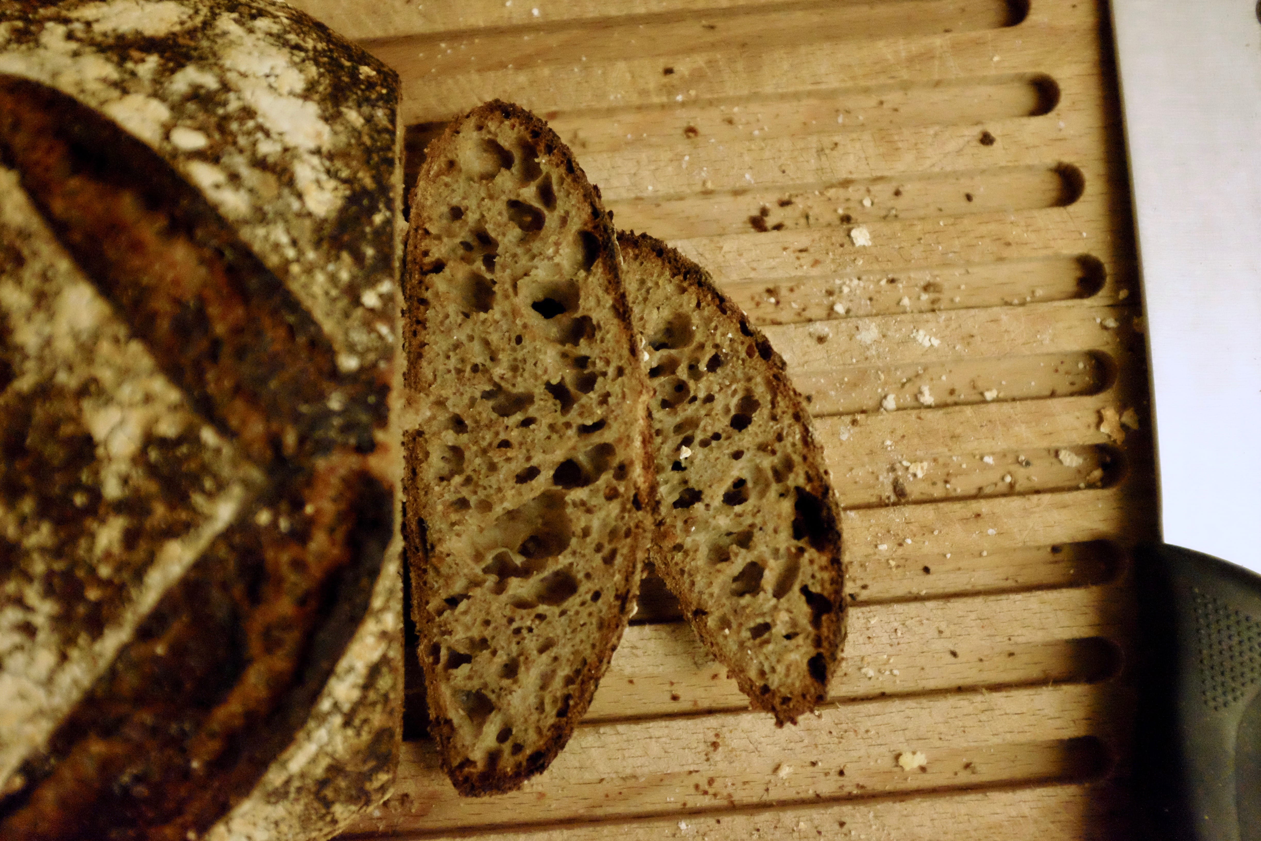 Two slices of bread, showing the inside crumb