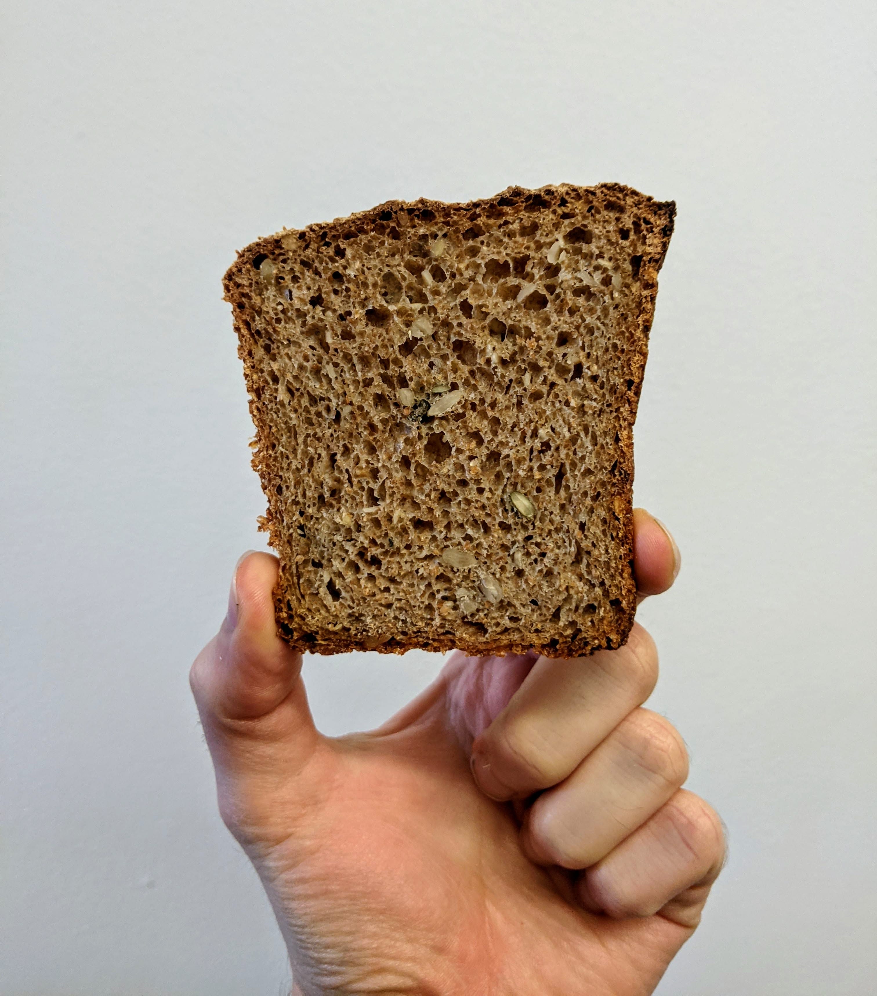 An image of a bread called “Hartog Volkoren with an Open Crumb”